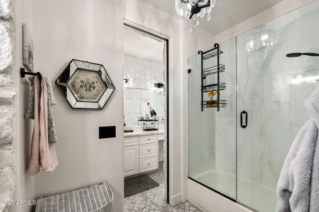 a view of a chairs and table in backyard of the house