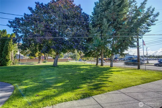 a view of a swimming pool with a garden
