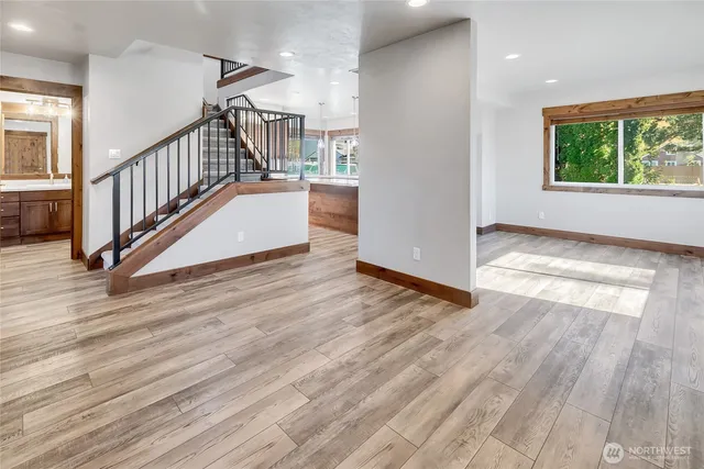 a view of entryway with wooden floor