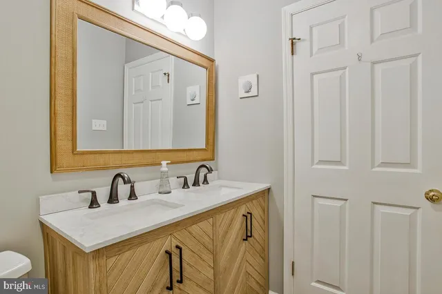 a bed room with a bed and a desk