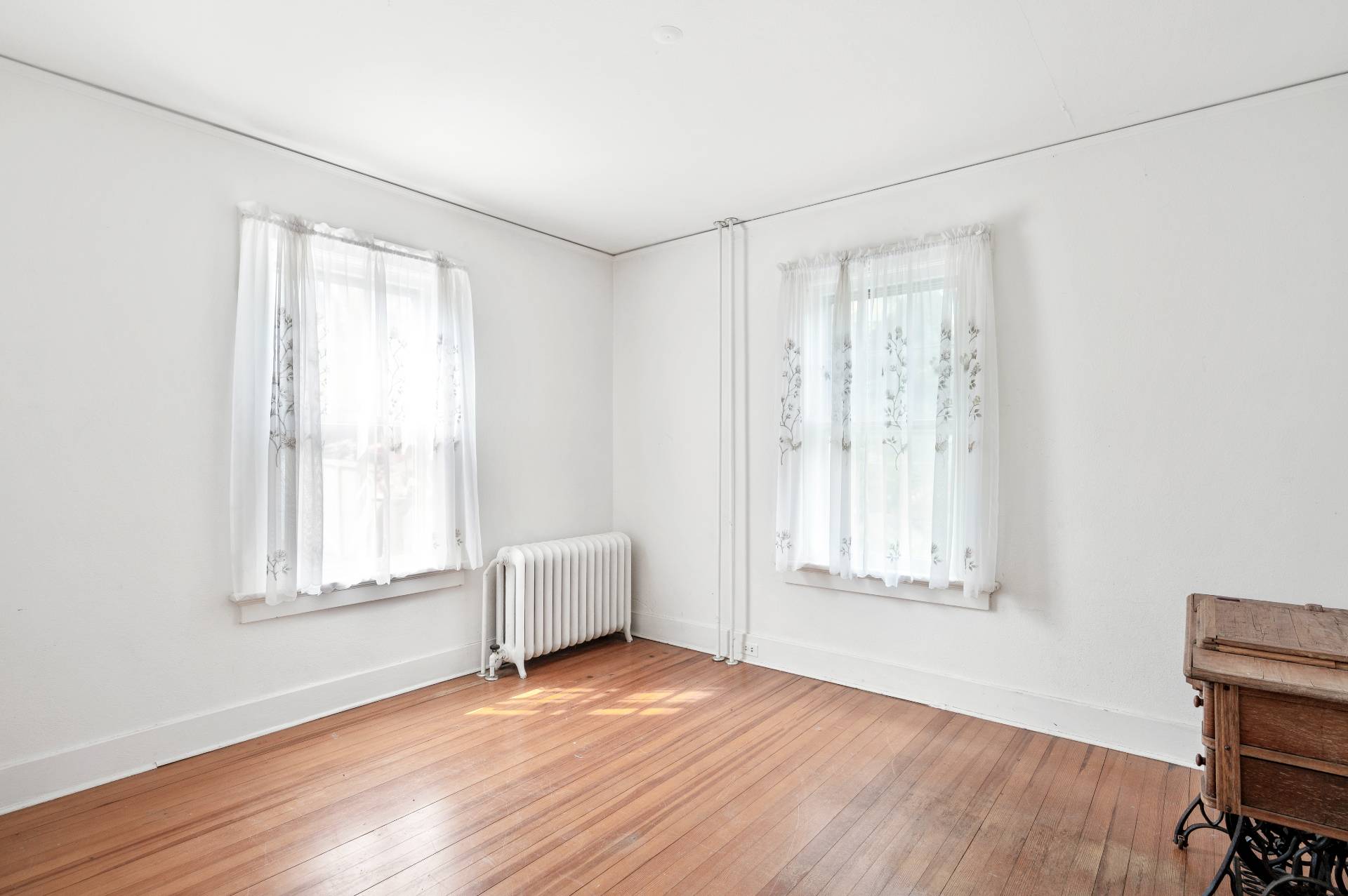 41 Sherrill Road East Hampton, NY 11937 - Photo 15 of 24 an empty room with wooden floor and windows