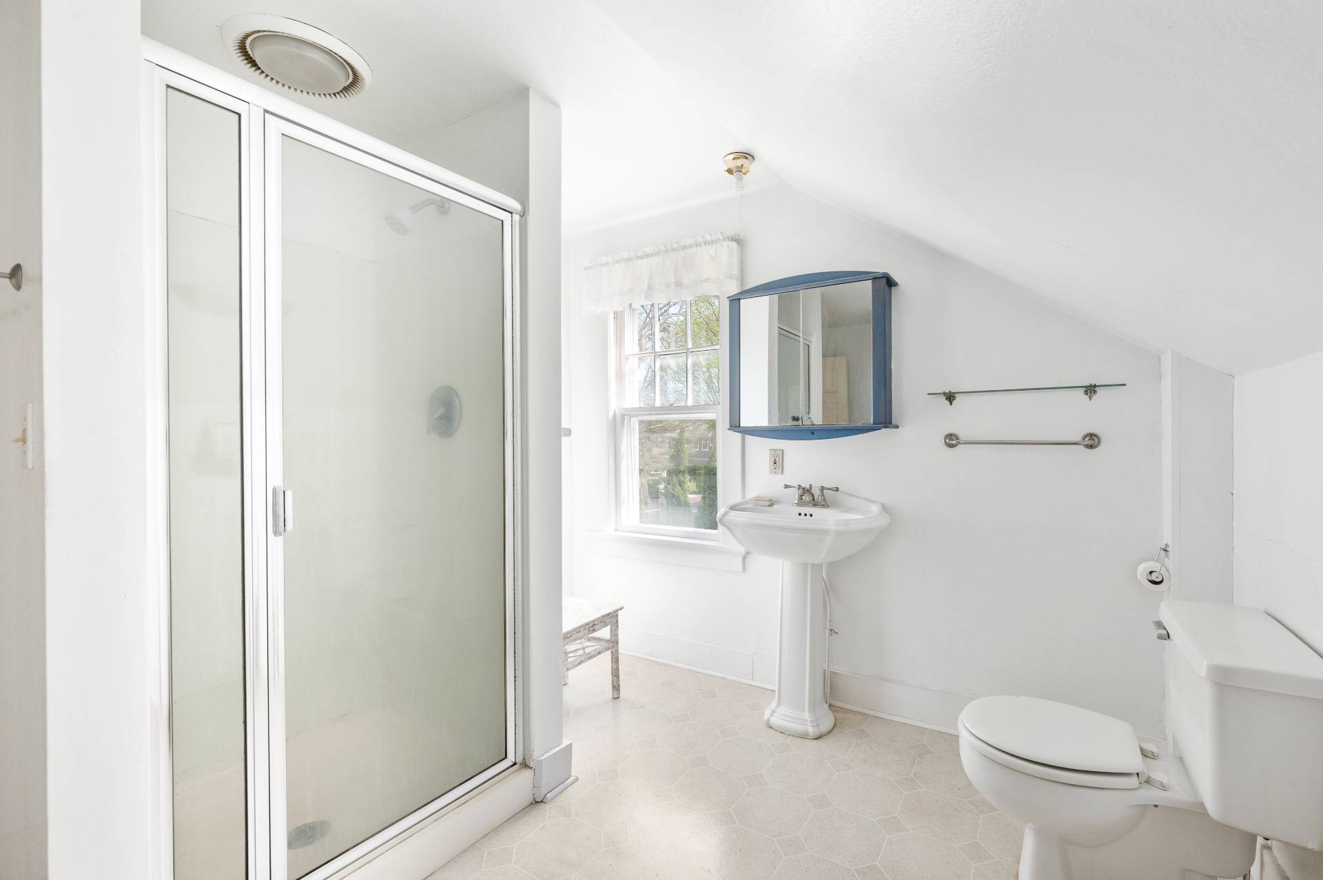 41 Sherrill Road East Hampton, NY 11937 - Photo 21 of 24 a bathroom with a toilet sink and mirror