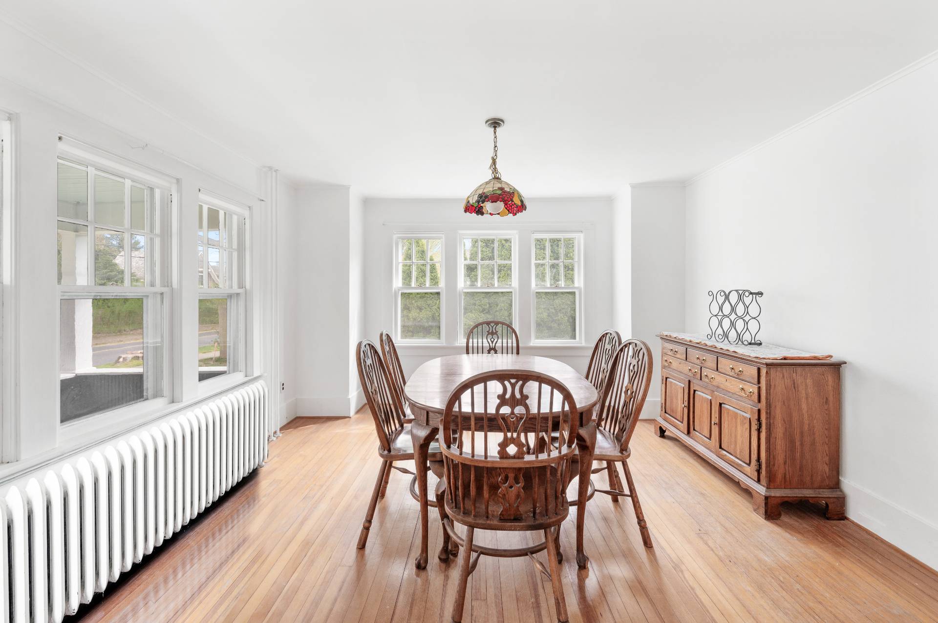 41 Sherrill Road East Hampton, NY 11937 - Photo 10 of 24 a view of a dining room with furniture window and wooden floor