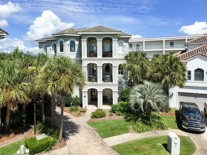 a spacious bathroom with a granite countertop sink mirror and a bathtub