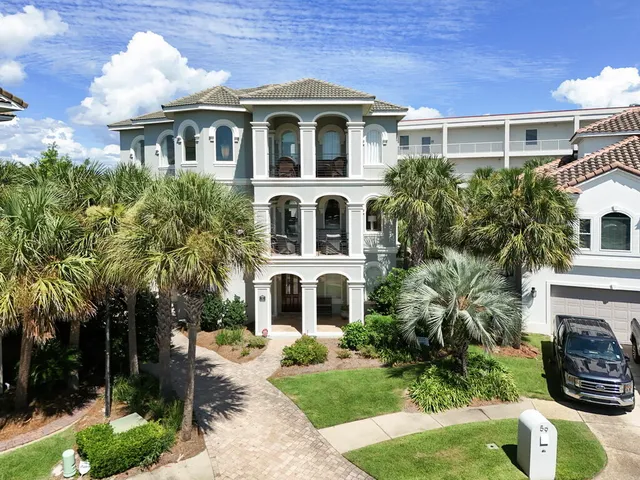 a spacious bathroom with a granite countertop sink mirror and a bathtub