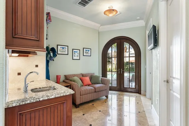 a bedroom with a bed and a mirror