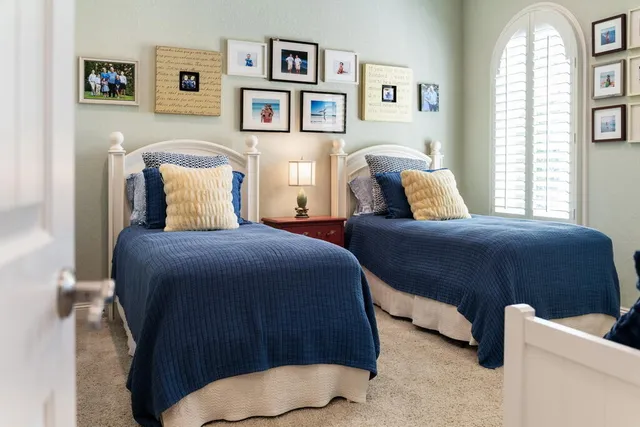 a bathroom with a granite countertop sink mirror and a