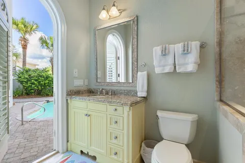 a view of a swimming pool with a lounge chairs