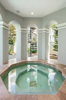 a kitchen with a sink and a washer dryer