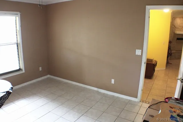 a view of a room with a window