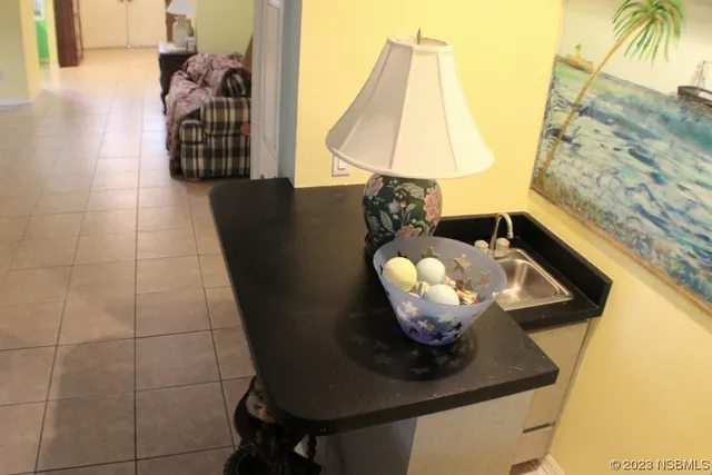 a view of dining room with table and chairs