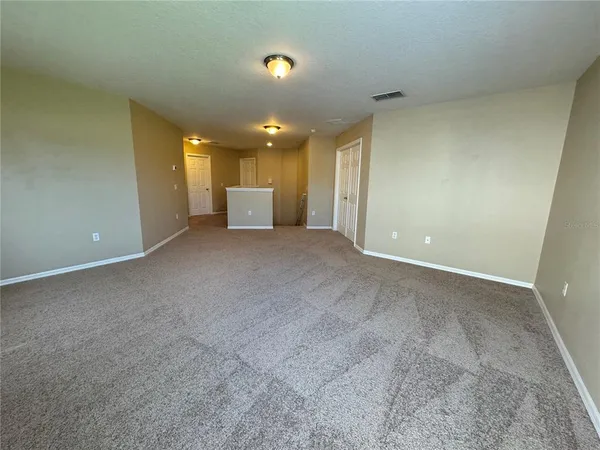 a view of a lake with a big yard