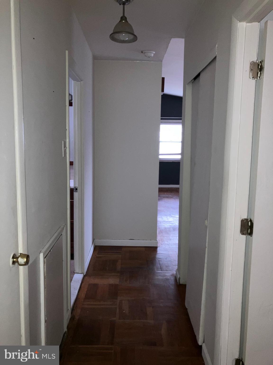 10031 Bridle Road Philadelphia, PA 19116 - Photo 19 of 32 a view of a hallway with wooden floor and staircase
