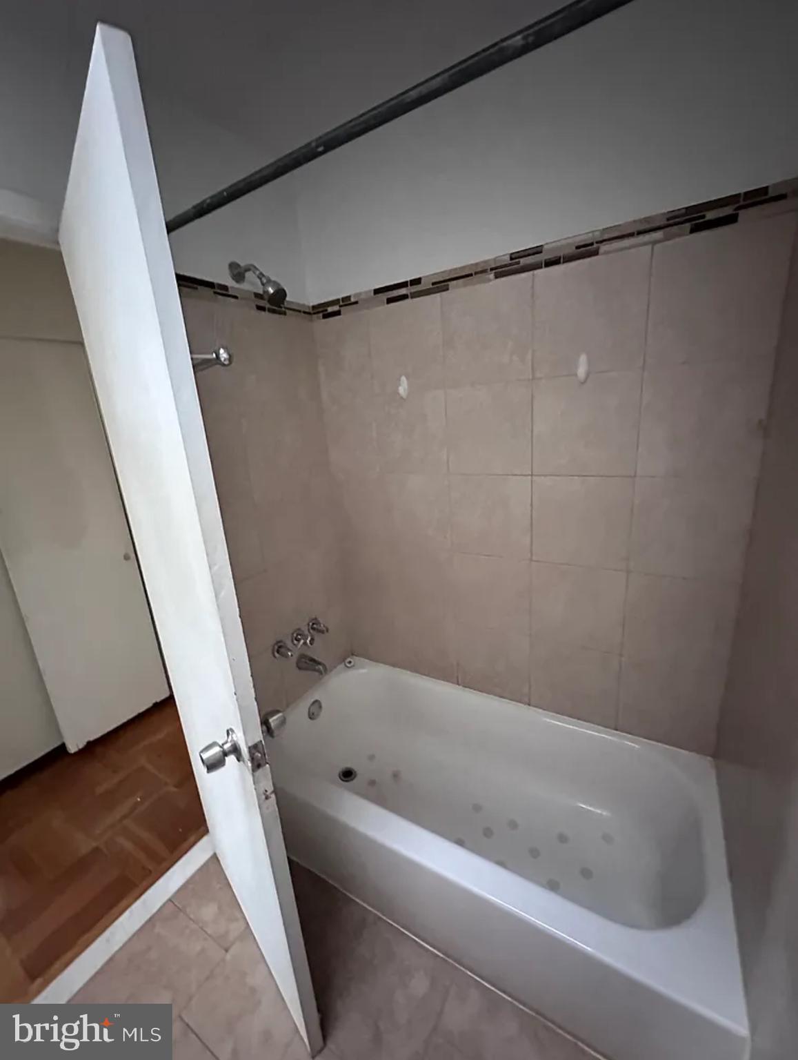 10031 Bridle Road Philadelphia, PA 19116 - Photo 23 of 32 a bathroom with a bathtub and a shower