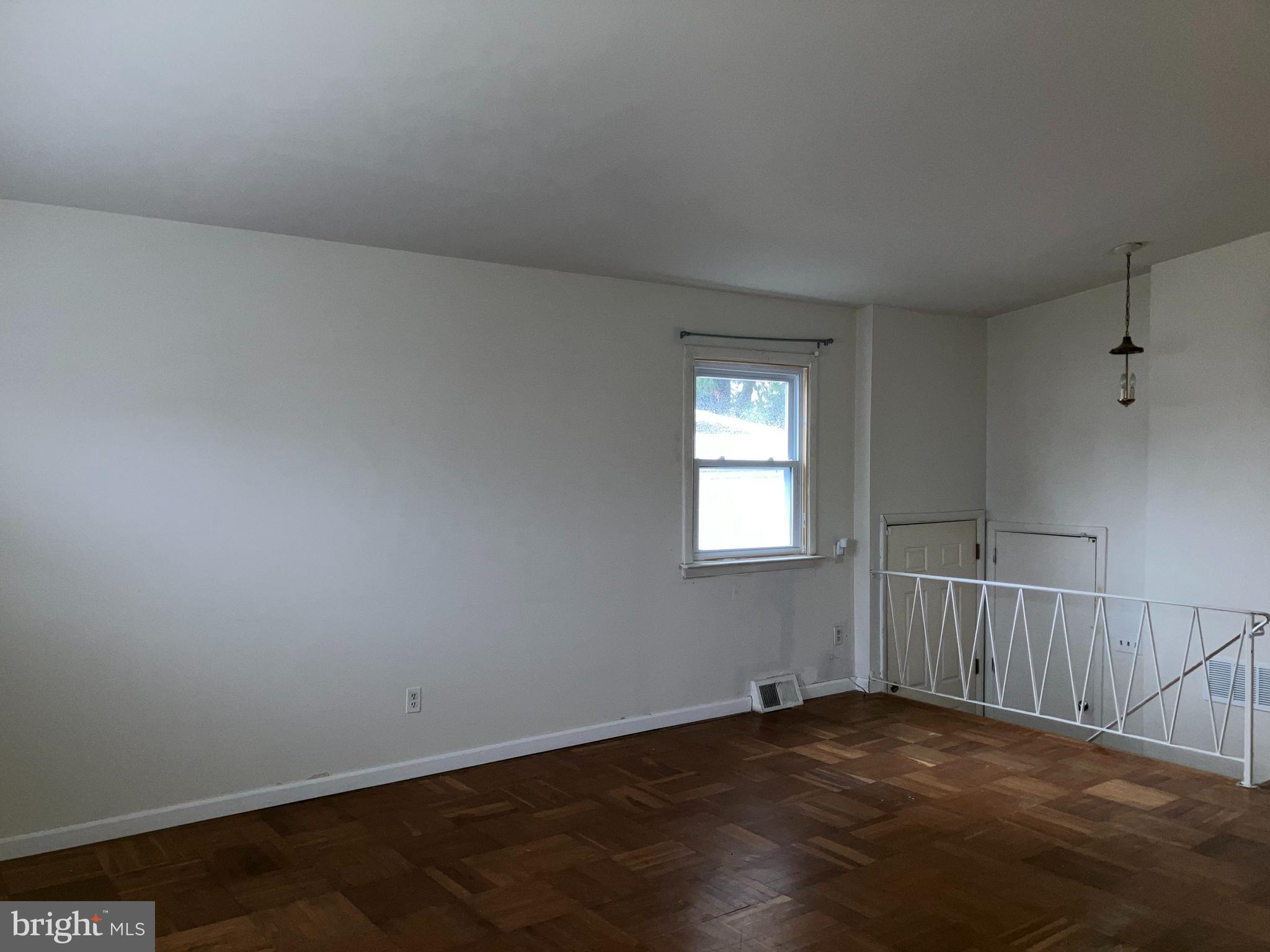 10031 Bridle Road Philadelphia, PA 19116 - Photo 6 of 32 a view of an empty room with a window