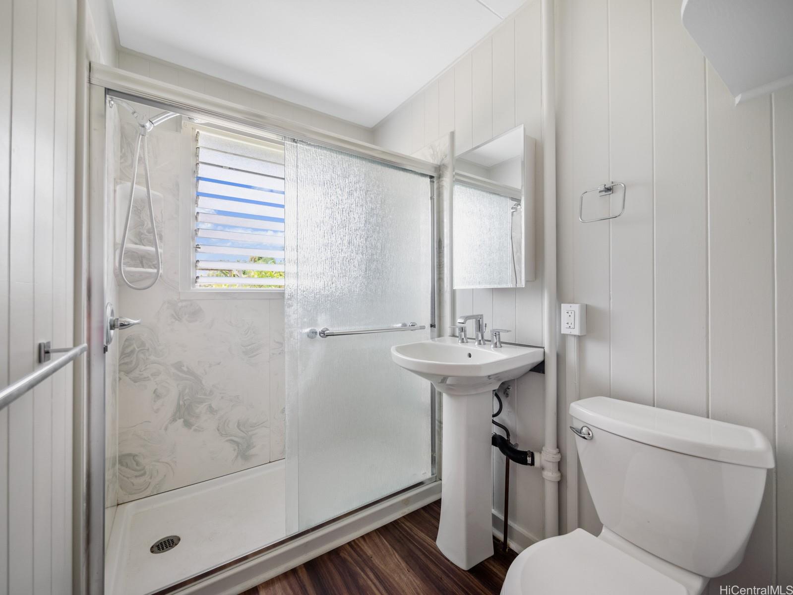 45-510 Pahia Road Kaneohe, HI 96744 - Photo 11 of 24 a bathroom with a sink toilet and shower