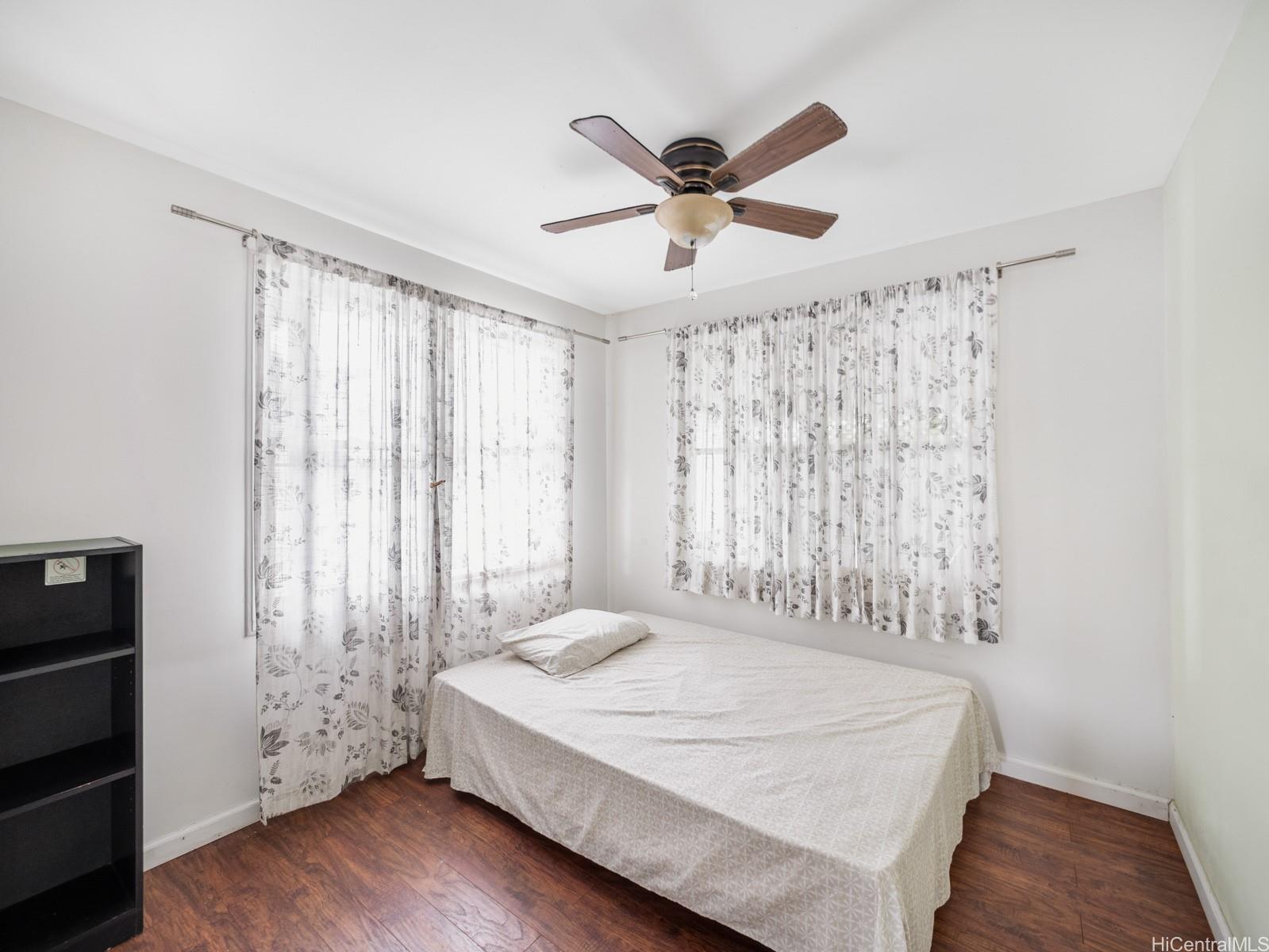 45-510 Pahia Road Kaneohe, HI 96744 - Photo 15 of 24 a spacious bedroom with a bed and a window