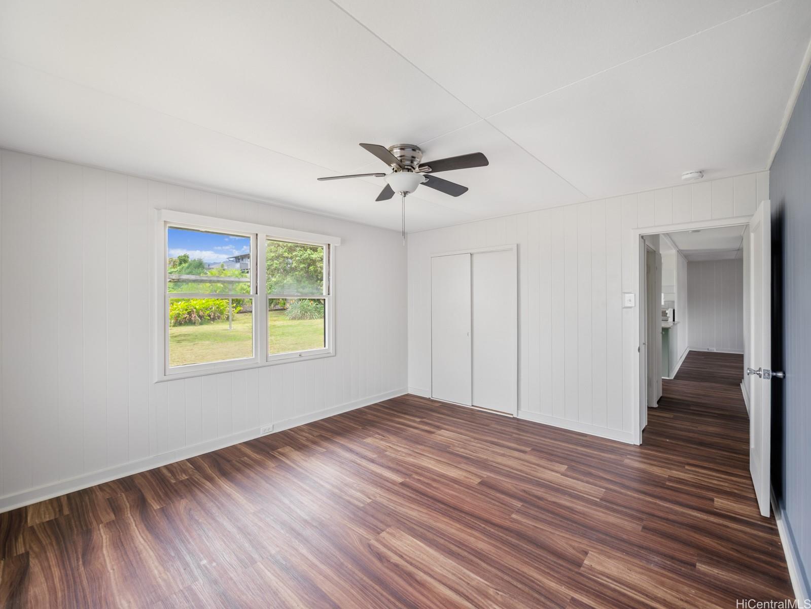45-510 Pahia Road Kaneohe, HI 96744 - Photo 7 of 24 wooden floor in an empty room with a window