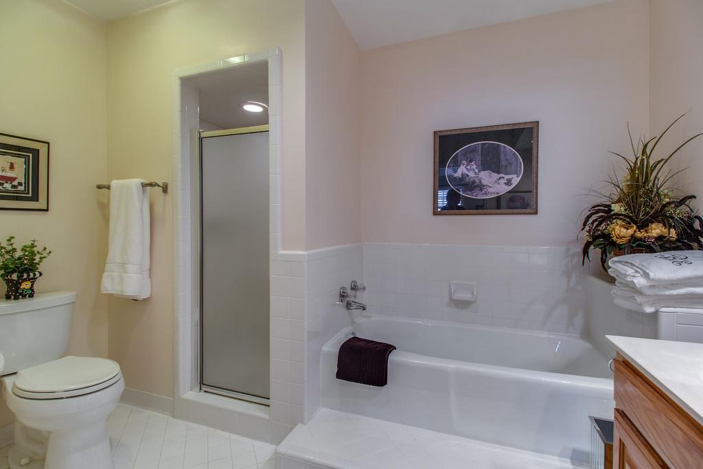 600 General George Patton Road Nashville, TN 37221 - Photo 13 of 18 a bathroom with a toilet a sink and bathtub