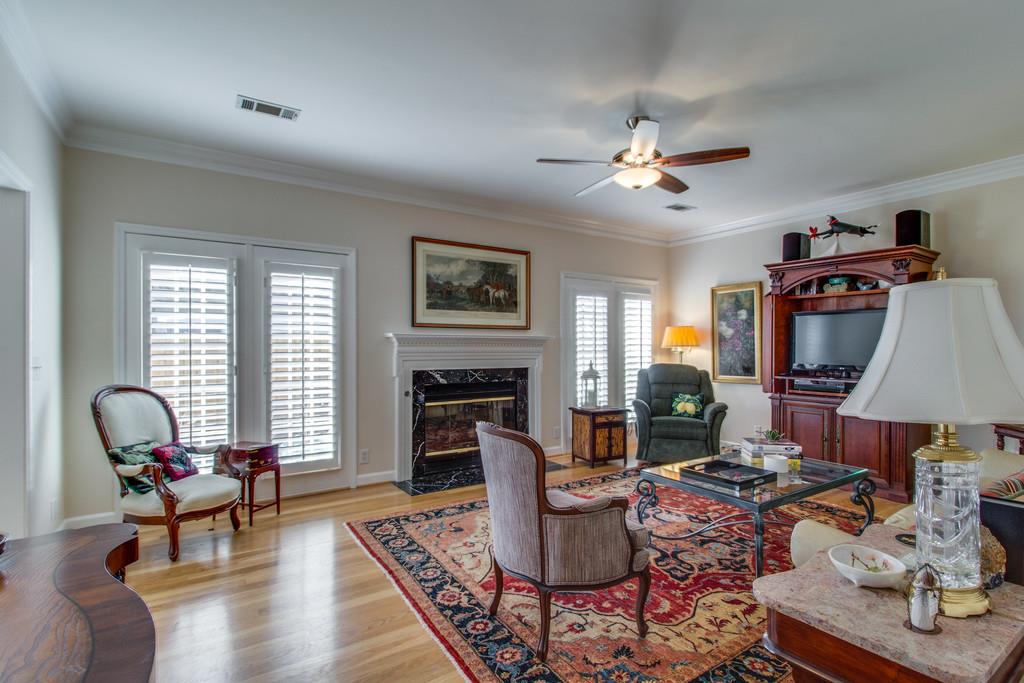 600 General George Patton Road Nashville, TN 37221 - Photo 3 of 18 a living room with furniture a fireplace and a window