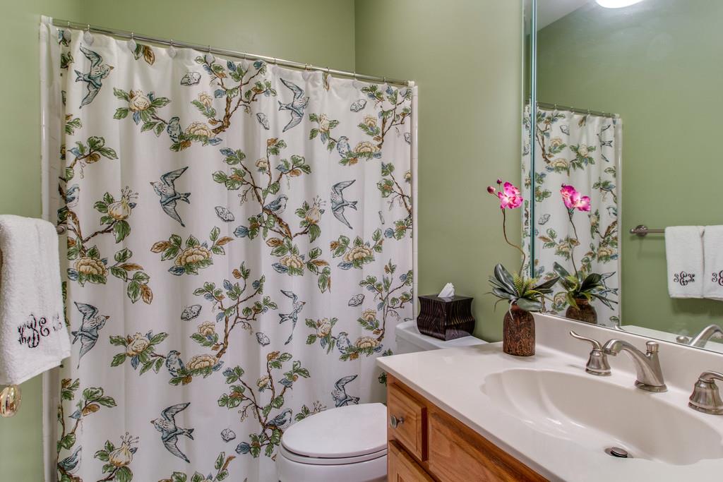 600 General George Patton Road Nashville, TN 37221 - Photo 9 of 18 a bathroom with a sink and a mirror