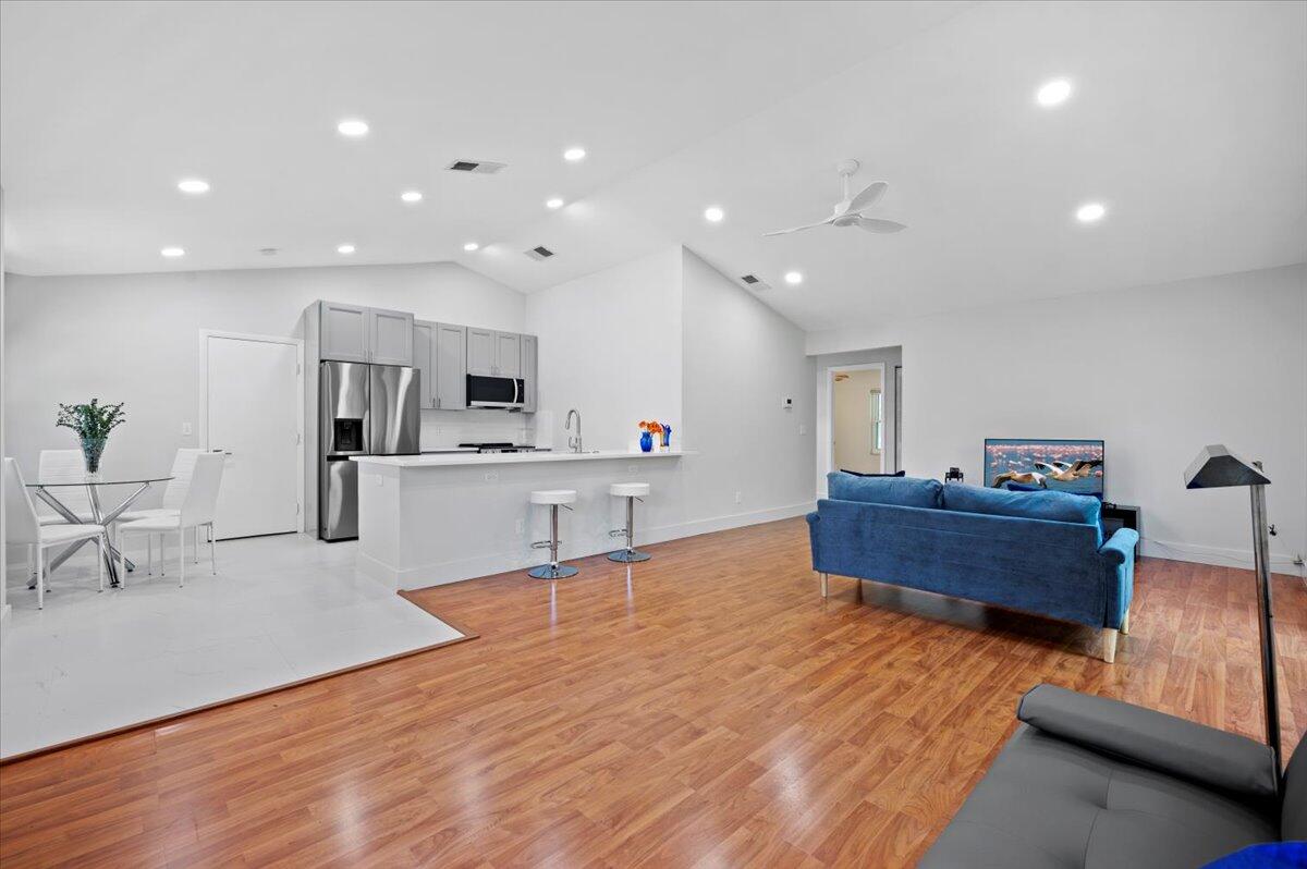 196 Raintree Trail Jupiter, FL 33458 - Photo 3 of 39 Open Living/Dining Areas