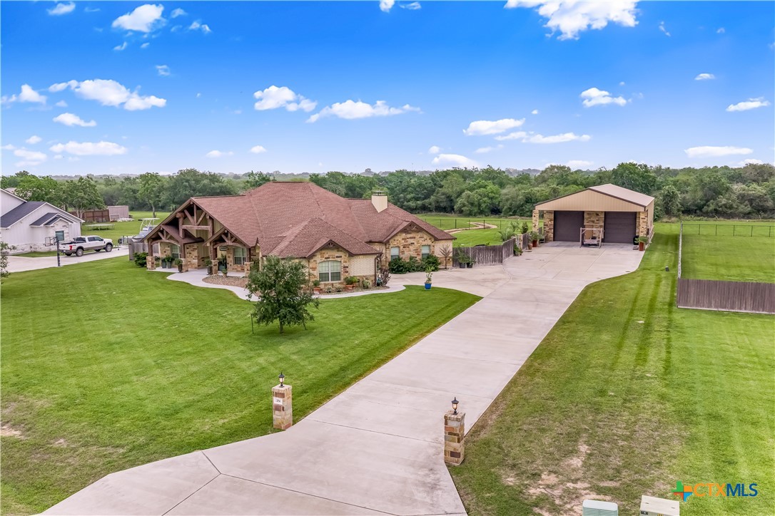 254 Sendera Loop Victoria, TX 77904 - Photo 7 of 48 a view of a garden with a house