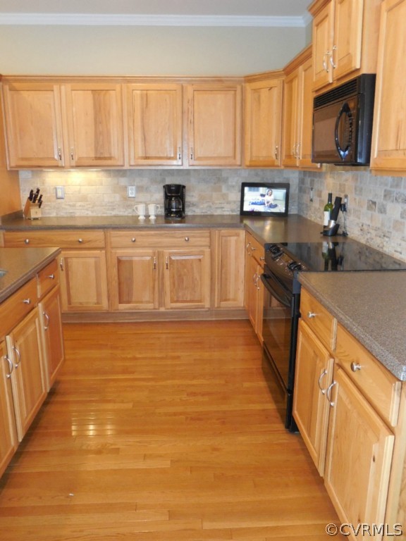 13213 Tipple Point Road Midlothian, VA 23114 - Photo 6 of 24 a kitchen with stainless steel appliances granite countertop a stove a sink and a microwave