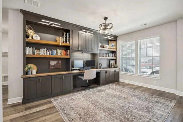 a kitchen with sink cabinets and window