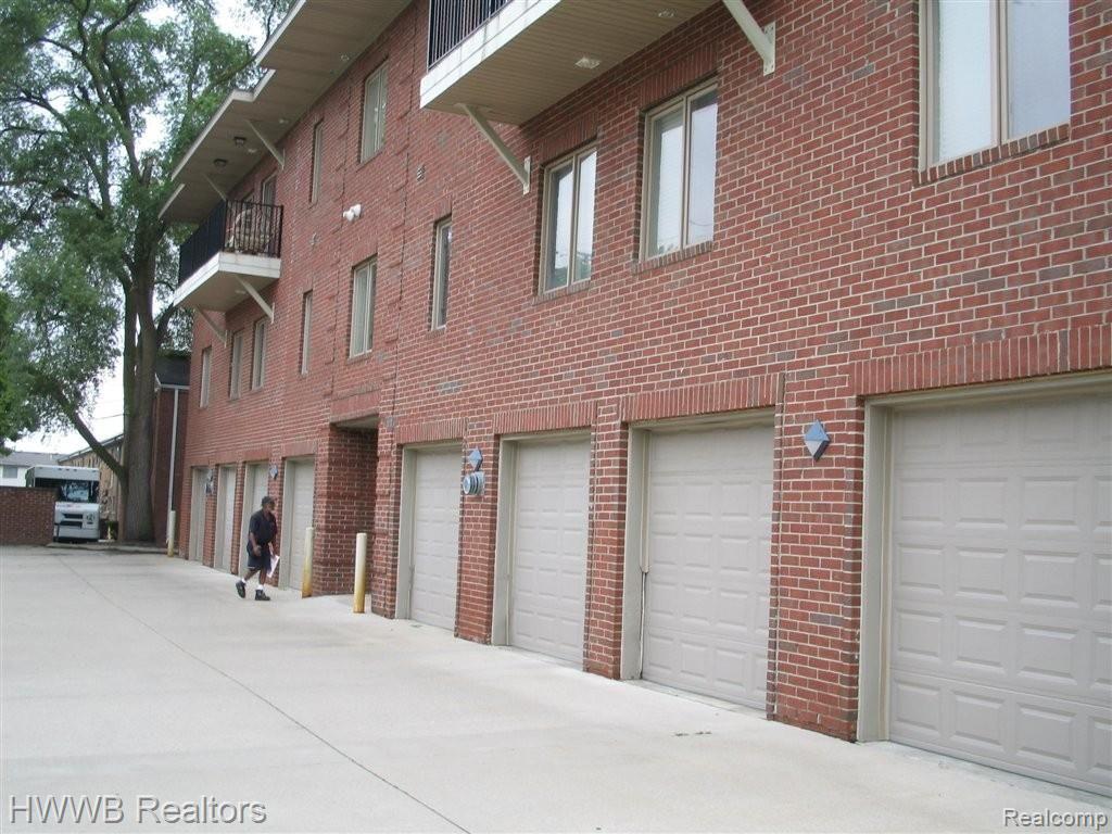 2711 East Maple Road Birmingham, MI 48009 - Photo 2 of 5 Back Exterior/Garages