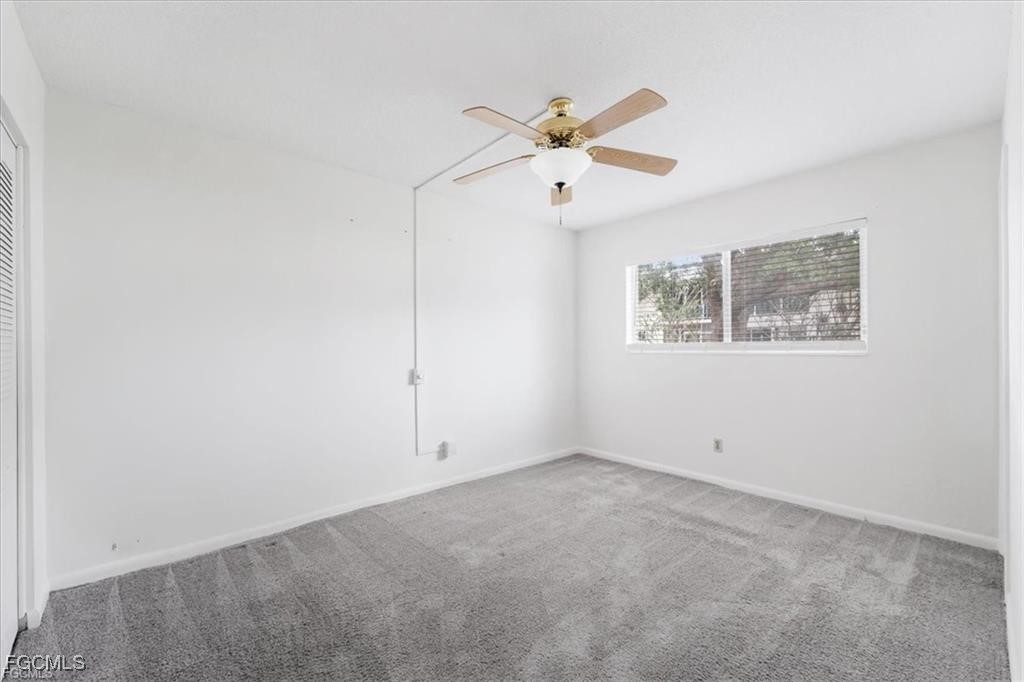 339 Joel Boulevard, Unit 121 Lehigh Acres, FL 33936 - Photo 14 of 40 a view of an empty room
