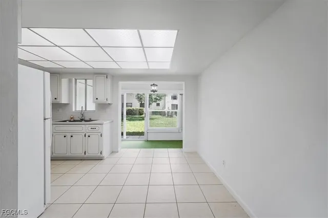 a bathroom with a sink a vanity and a mirror