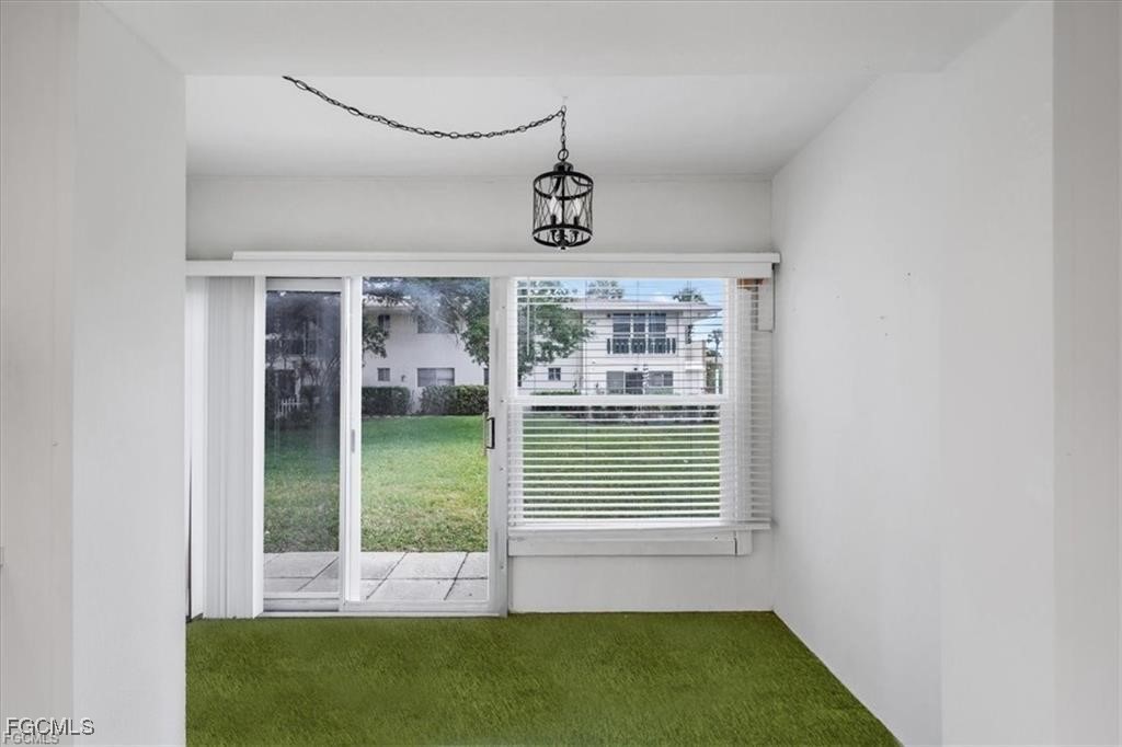 339 Joel Boulevard, Unit 121 Lehigh Acres, FL 33936 - Photo 24 of 40 a view of outdoor space and window