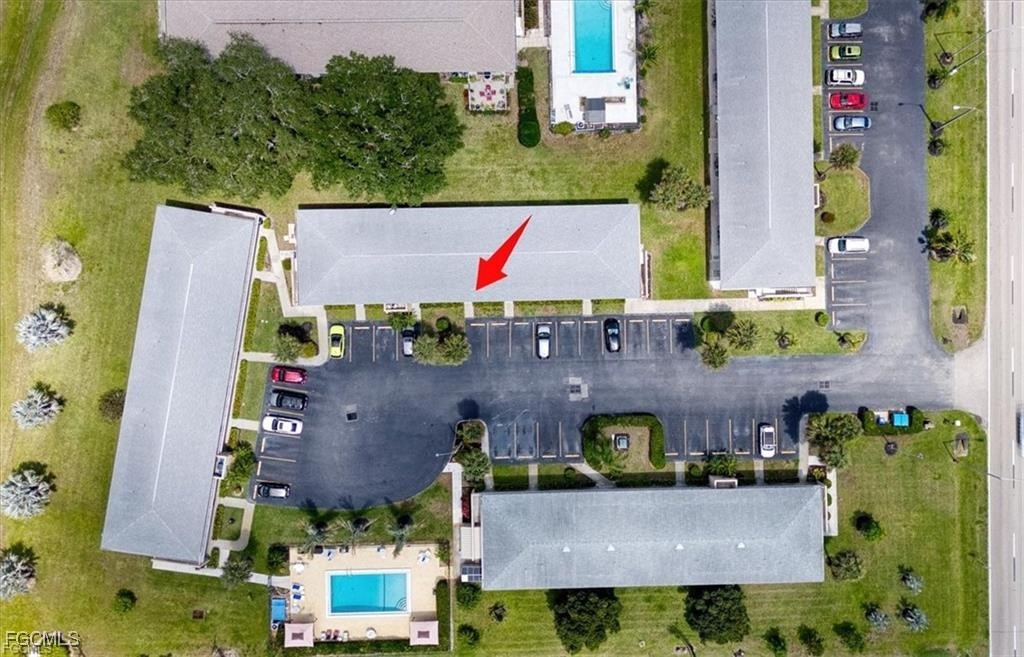 339 Joel Boulevard, Unit 121 Lehigh Acres, FL 33936 - Photo 37 of 40 an aerial view of multiple house