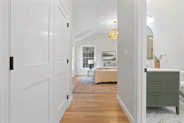 a view of a bedroom from a hallway