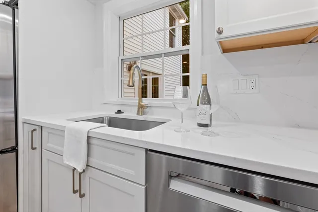 a utility room with cabinets