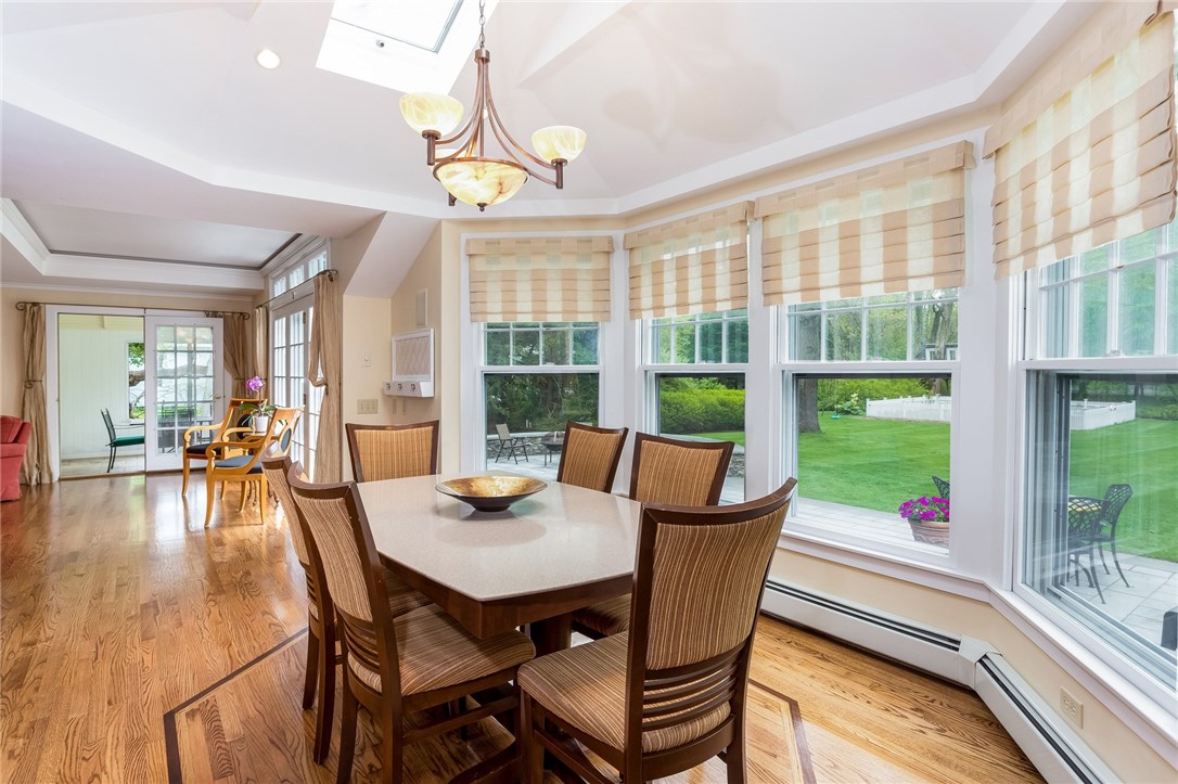 12 Nathaniel Road Barrington, RI 02806 - Photo 11 of 38 Dining Area open to family room and screened in porch