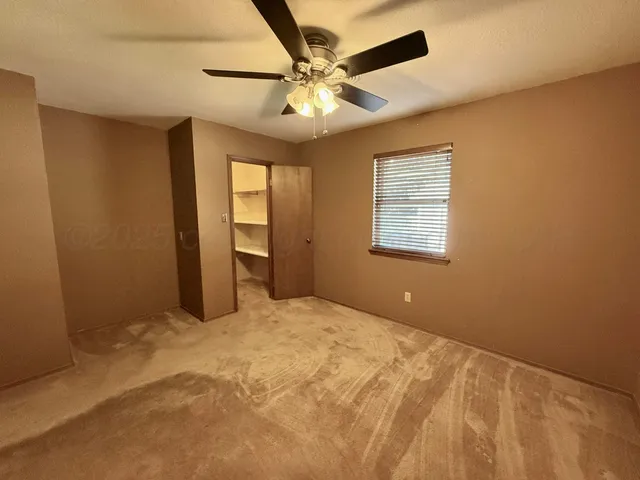 a bathroom with a sink a toilet a mirror and vanity