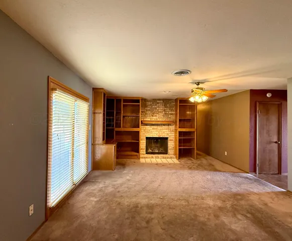 a view of a livingroom with a fireplace