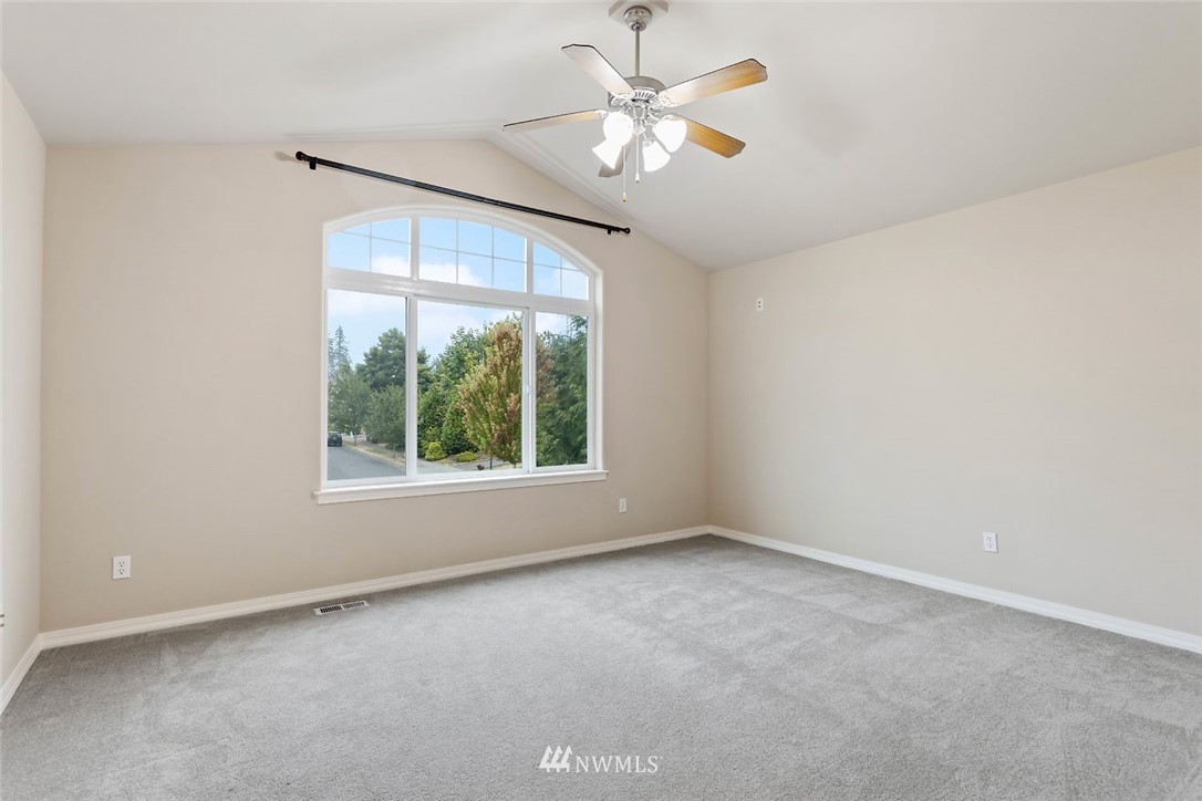 4124 215th Street Southeast Bothell, WA 98021 - Photo 21 of 30 an empty room with a window
