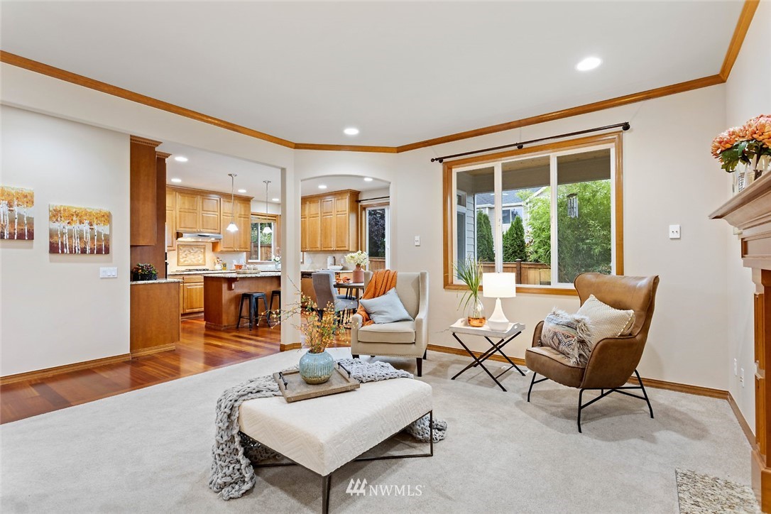 4124 215th Street Southeast Bothell, WA 98021 - Photo 10 of 30 a living room with furniture and a large window