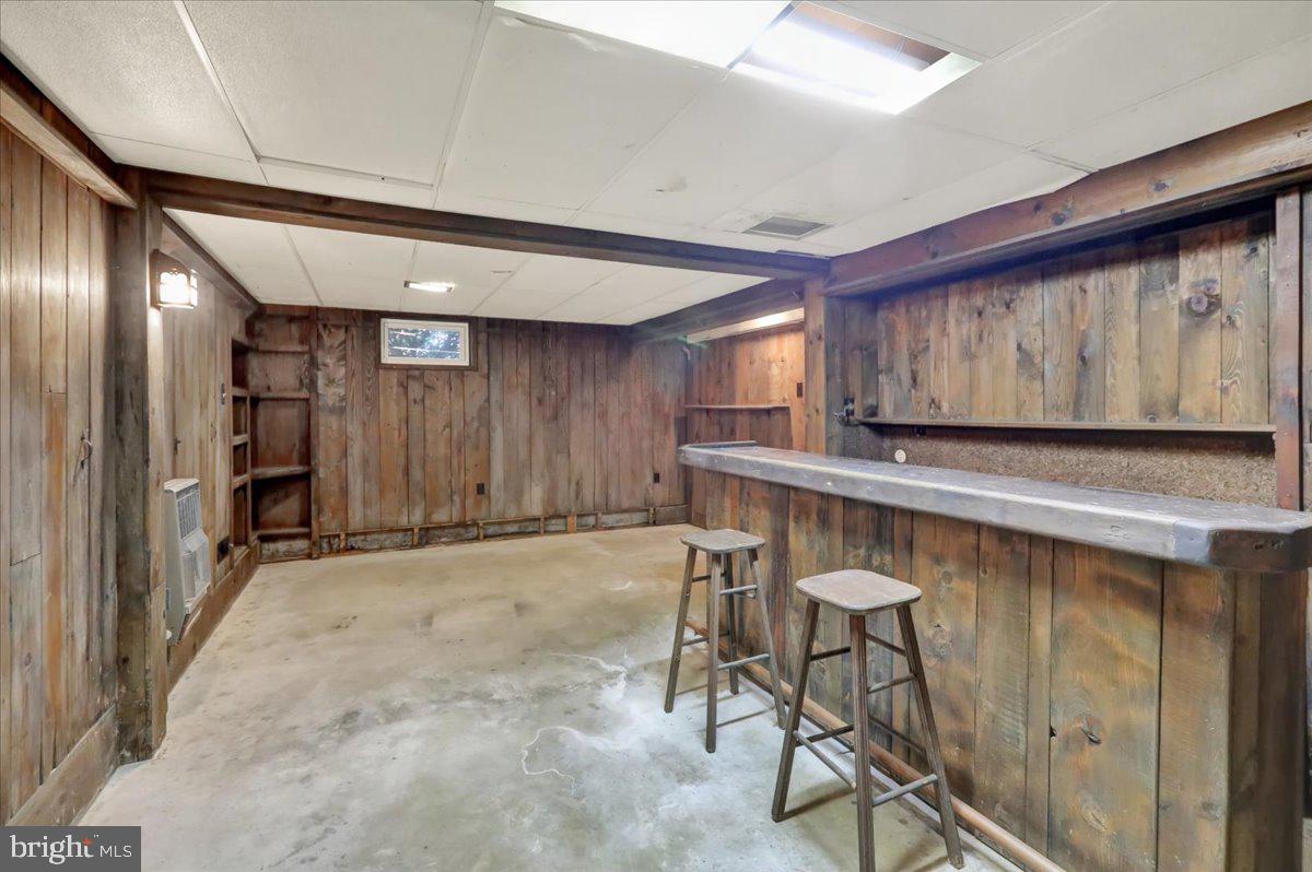 603 Governor Drive Reading, PA 19607 - Photo 39 of 41 a view of an empty room with wooden floor and furniture