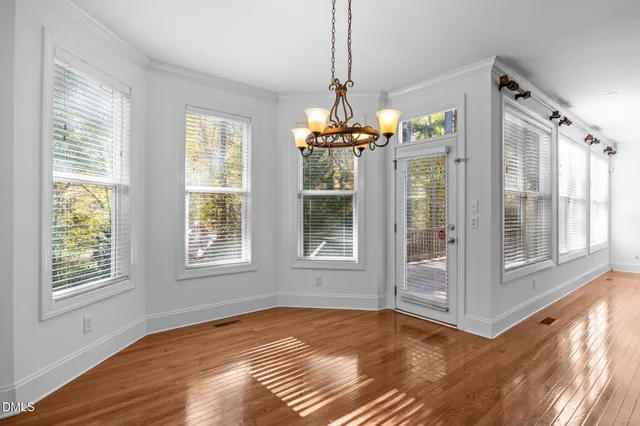 a kitchen with stainless steel appliances granite countertop a refrigerator stove and sink