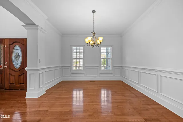 a view of a kitchen cabinets and wooden floor