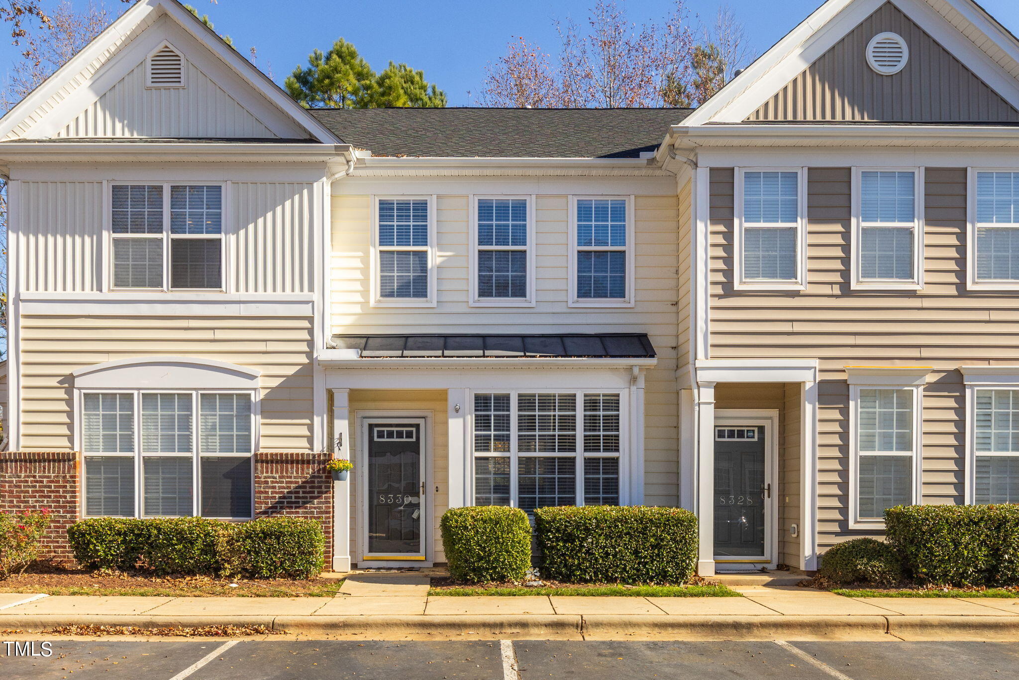 8330 City Loft Court Raleigh, NC 27613 - Photo 1 of 23 a front view of a house