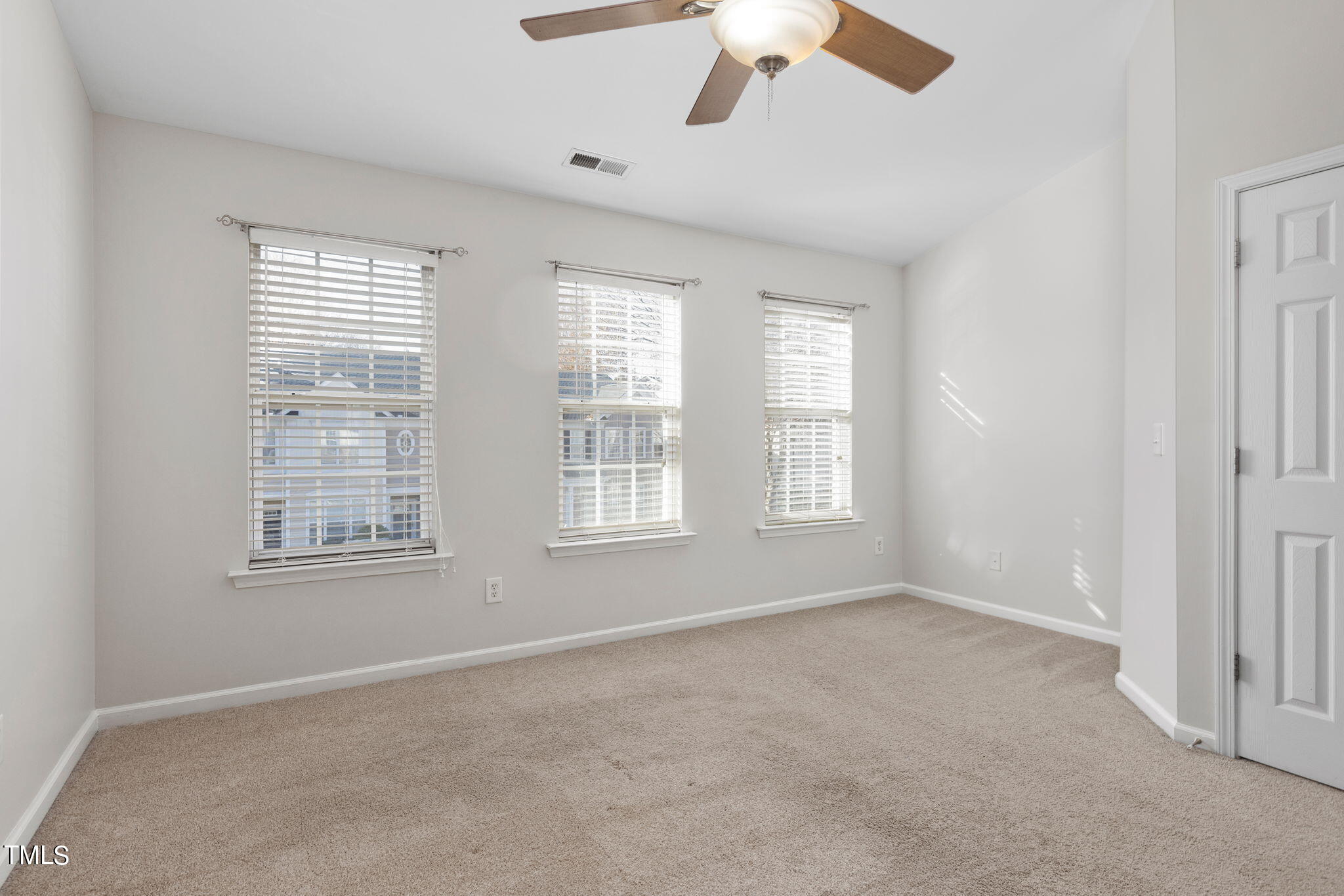 8330 City Loft Court Raleigh, NC 27613 - Photo 14 of 23 a view of an empty room with a window