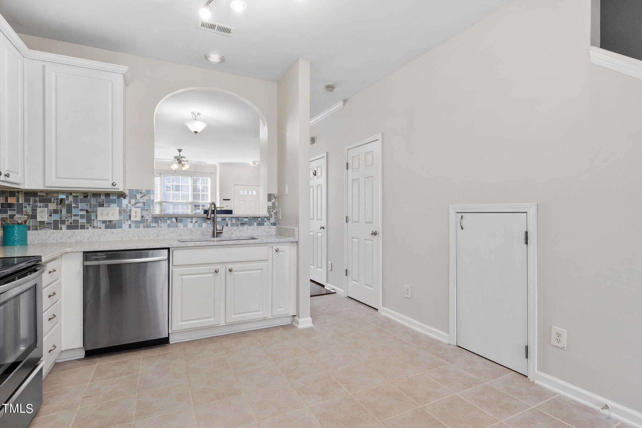 8330 City Loft Court Raleigh, NC 27613 - Photo 10 of 23 a bathroom with a sink vanity granite tub and a mirror