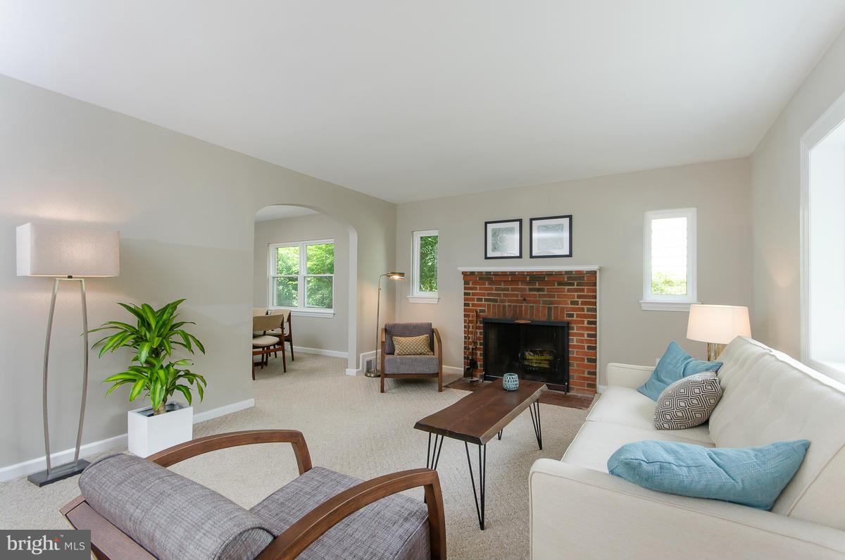 9306 Wire Avenue Silver Spring, MD 20901 - Photo 4 of 29 Living Room w/ wood burning fireplace