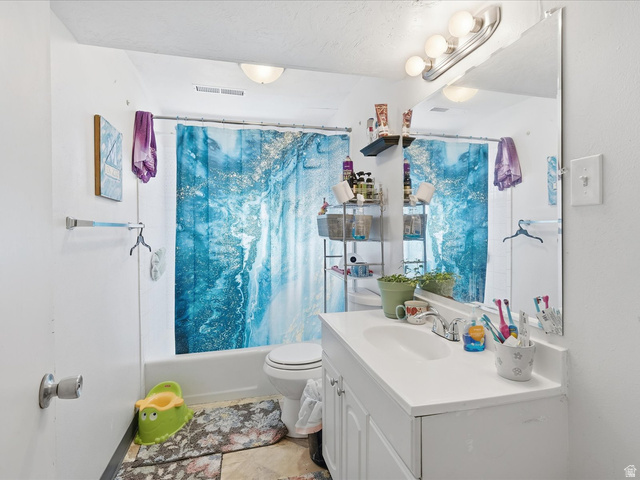 322 East 900 North Logan, UT 84321 - Photo 23 of 43 Full bath featuring vanity and shower / bath combo
