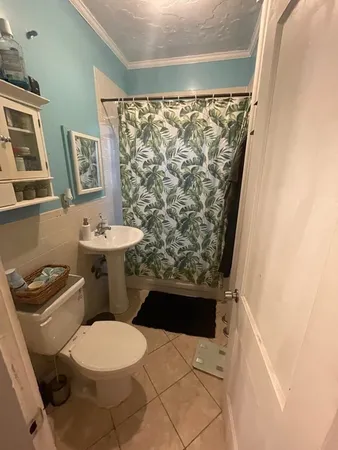 a bathroom with a sink and a toilet